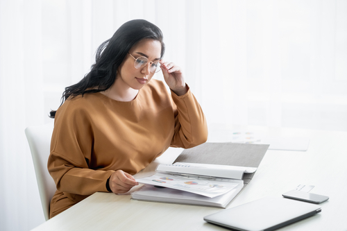 Businesswoman reading a report