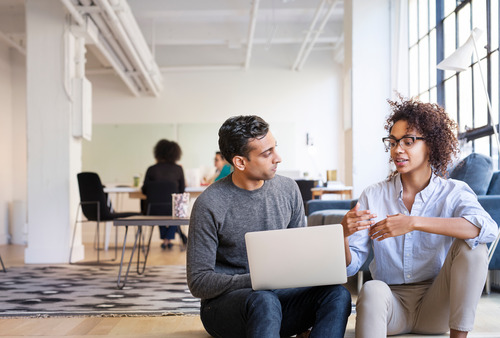 two businesspeople talking