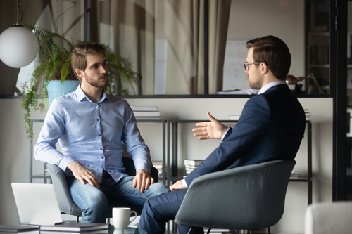 Two businessmen talking
