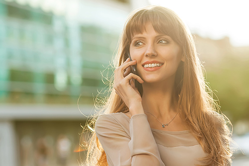 sophisticated-businesswoman-dress-talking-on-phone