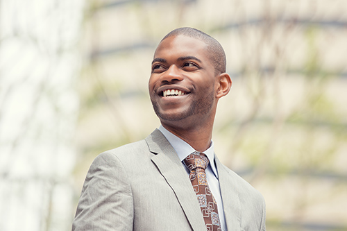 headshot-portrait-young-professional-man-smiling