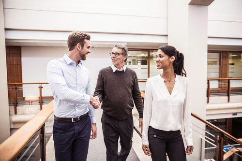 Three businesspeople talking