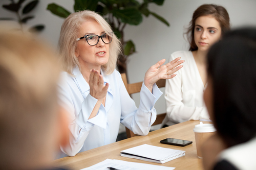 businesswoman leading a meeting
