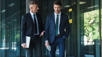 Two businessmen walking
