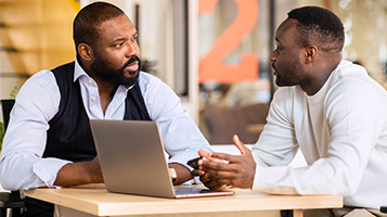 Two businesspeople talking